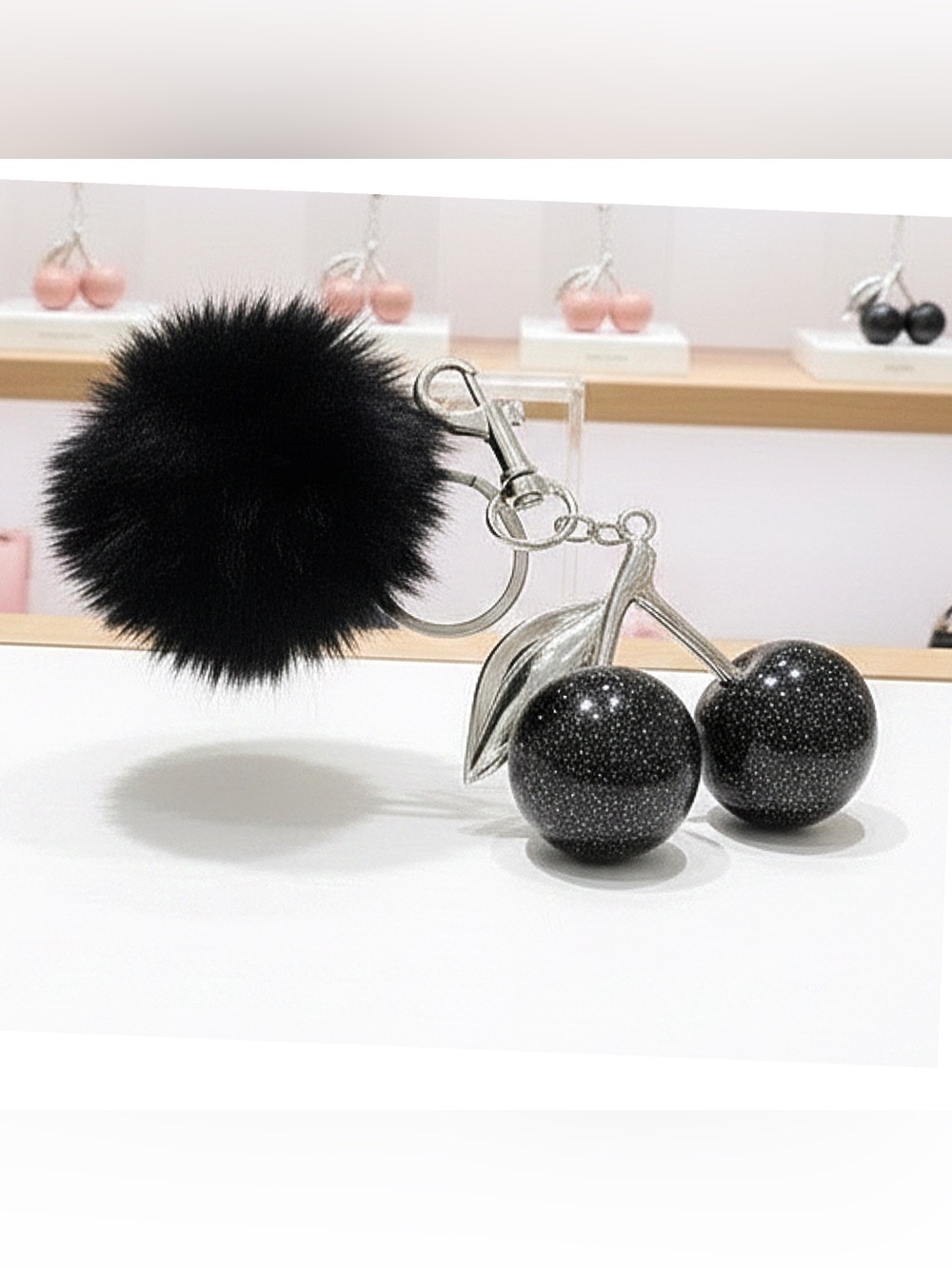NWOT Elegant Black and Silver Cherry Key Holder With Black Pom Pom